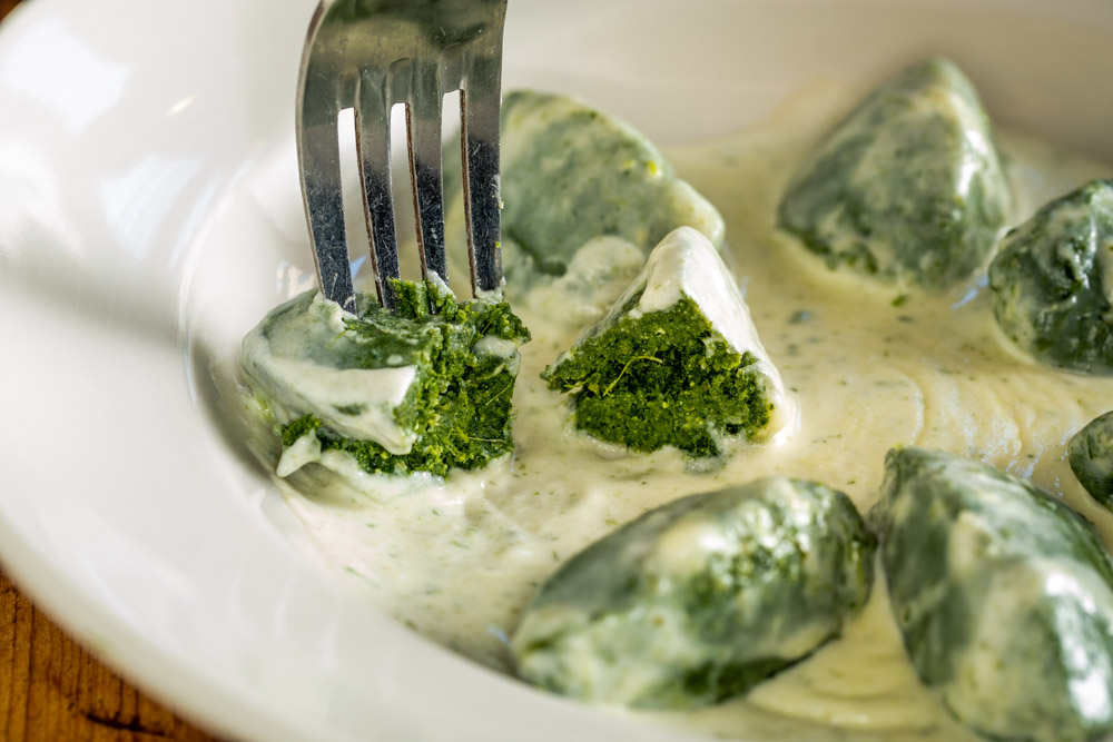 Spinach Housemade Gnudi is Convivium's most popular dish