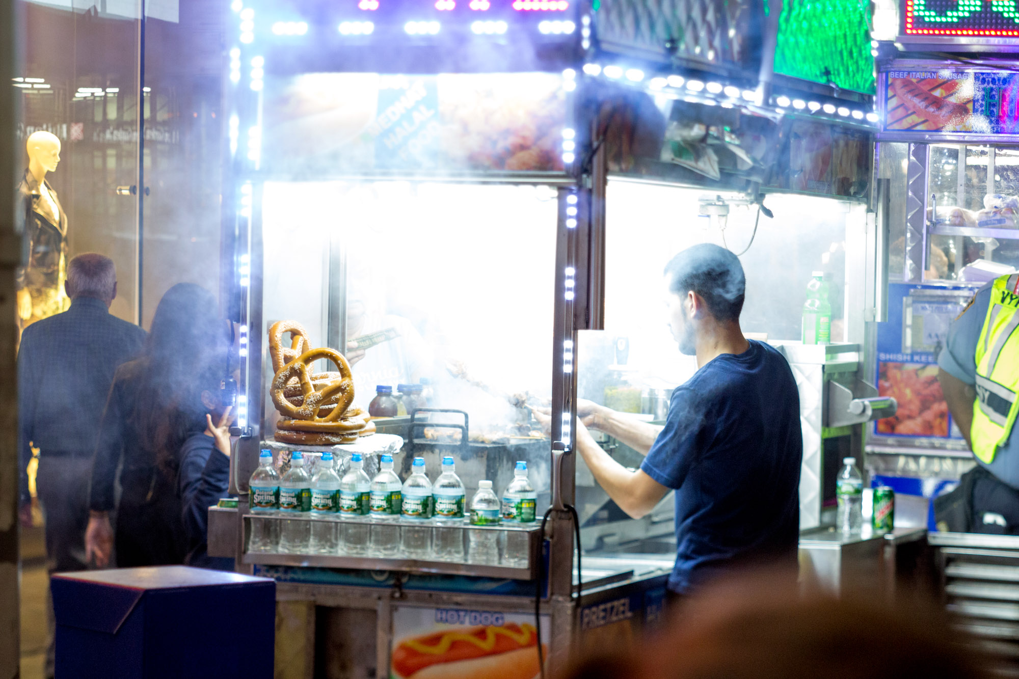 A food cart in New York city filled with smoke